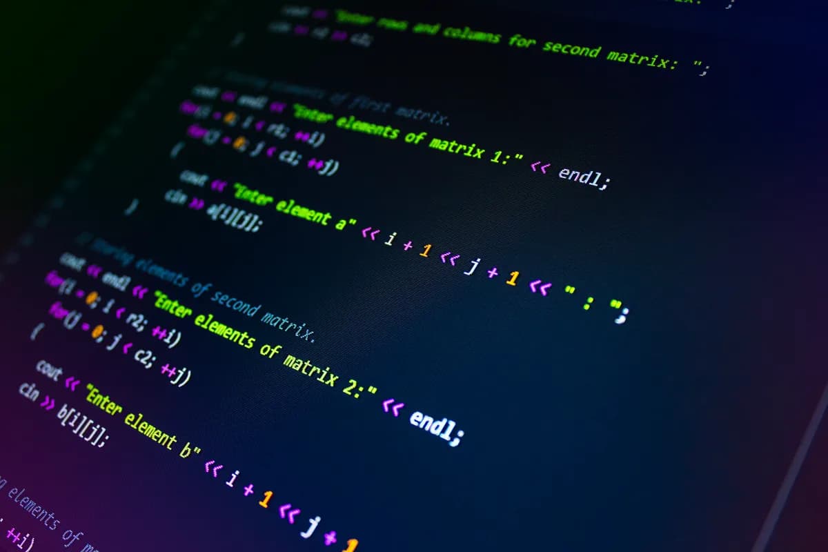 Close-up of colorful programming code displayed on a monitor screen